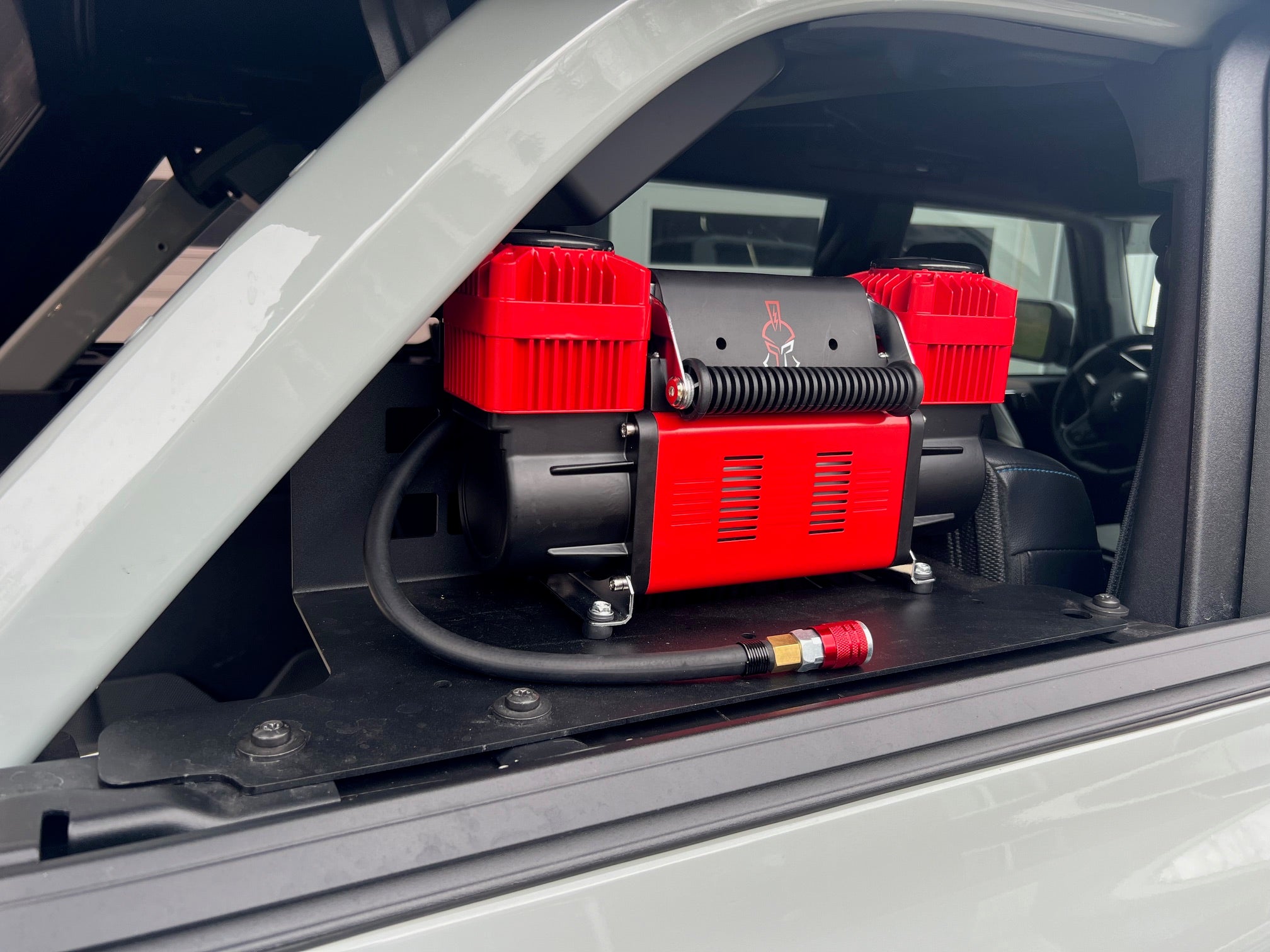Thor's Lightning Refuge MOLLE Portable Air Compressor Mount for 6th Generation Ford Bronco 4-Door 2021-Present Thor's Lightning Refuge MOLLE Portable Air Compressor Mount for 6th Generation Ford Bronco 4-Door 2021-Present